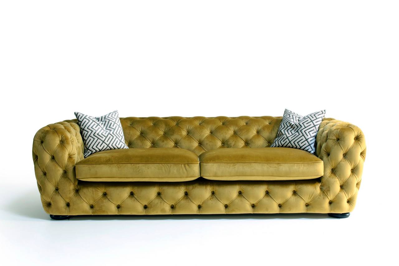 желтый диван с каретной стяжкой