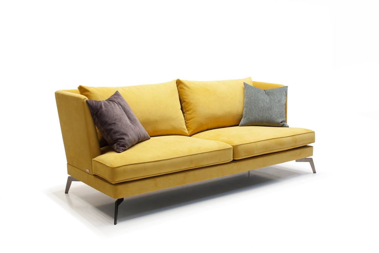 Желтый диван в интерьере разных стилей: особенности и правила выбора